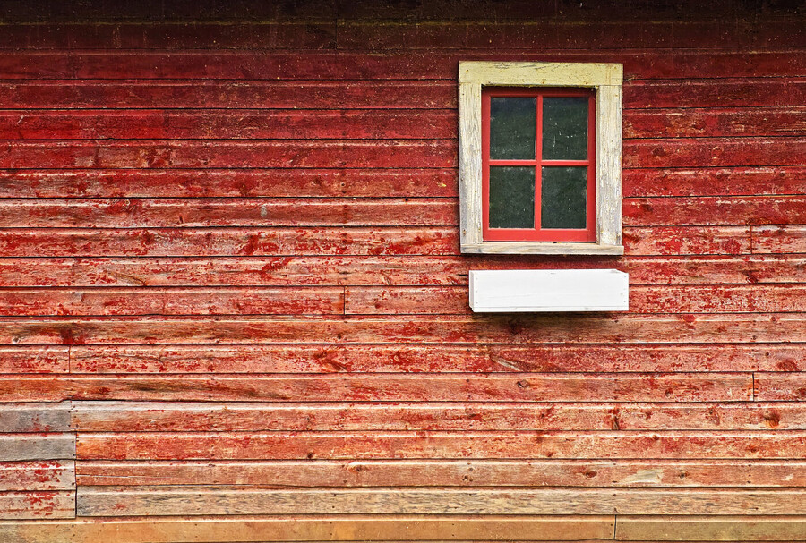 Deteriorating paint on building