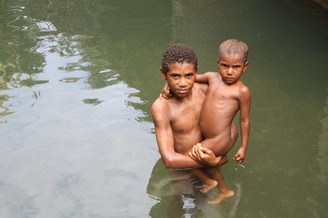 children in a river